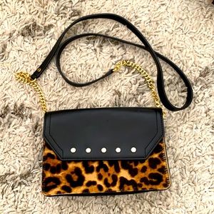 Milly leather and calf hair cross body mini